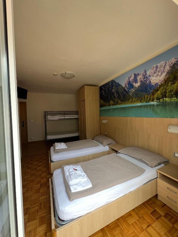 5denní zájezd (denní přejezd) s dopravou, polopenzí a skipasem v ceně – hotel Lory