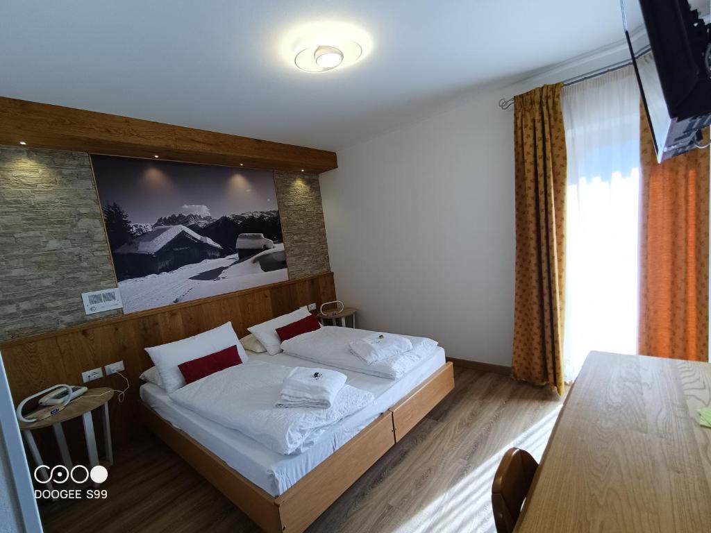 5denní zájezd s dopravou, polopenzí a skipasem v ceně – hotel Arnica