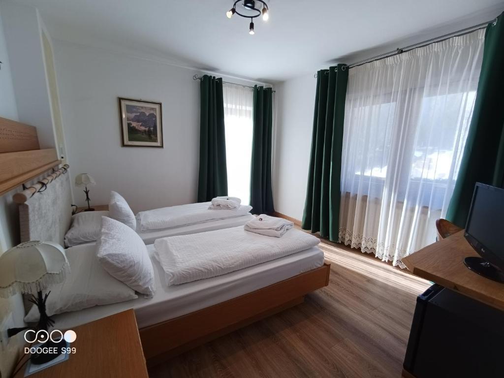 5denní zájezd s dopravou, polopenzí a skipasem v ceně – hotel Arnica