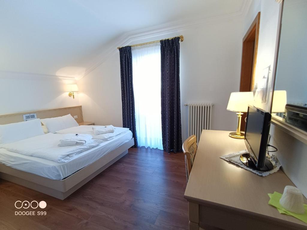 5denní zájezd s dopravou, polopenzí a skipasem v ceně – hotel Arnica
